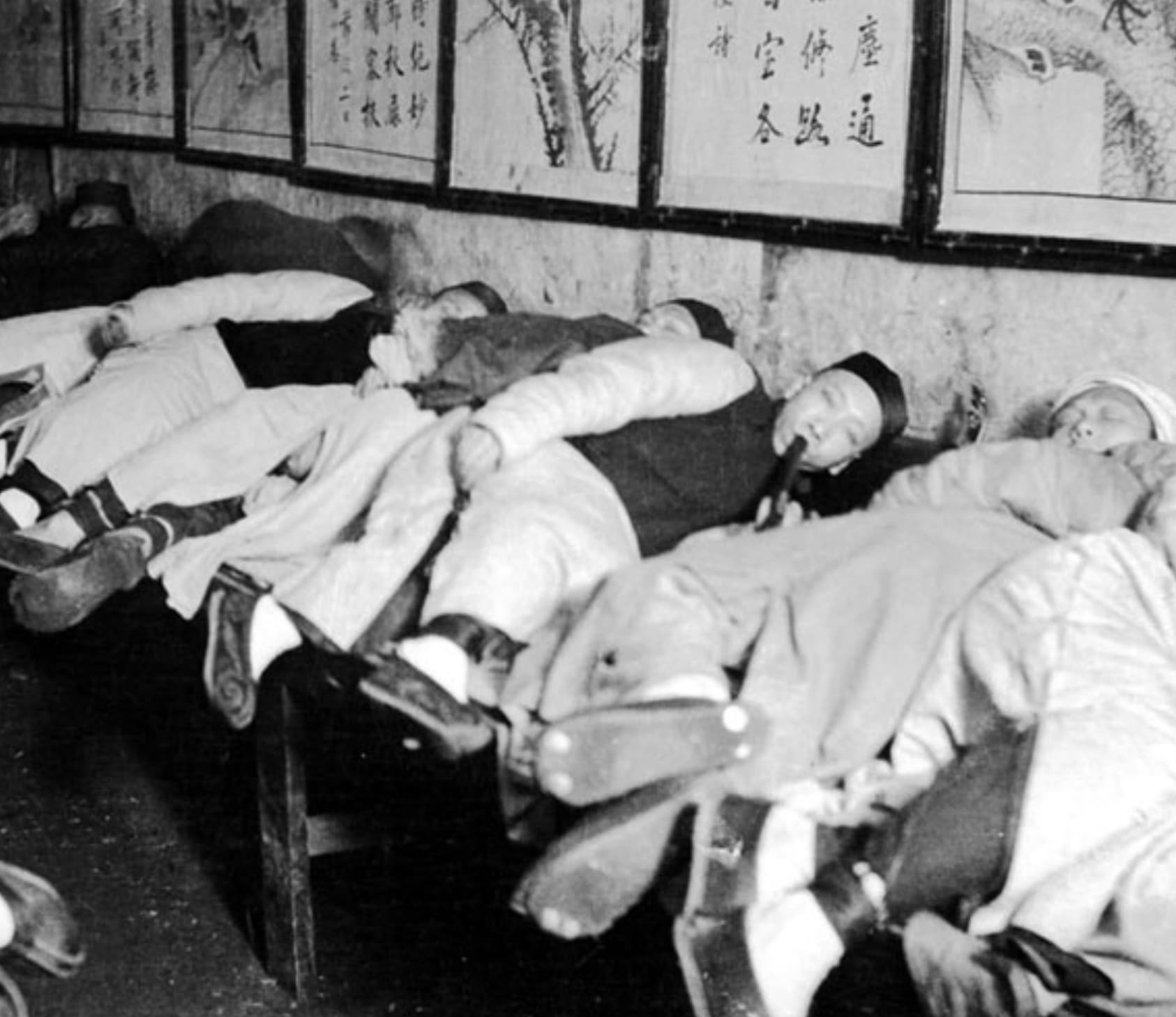 “A Chinese opium den, circa 1900.”